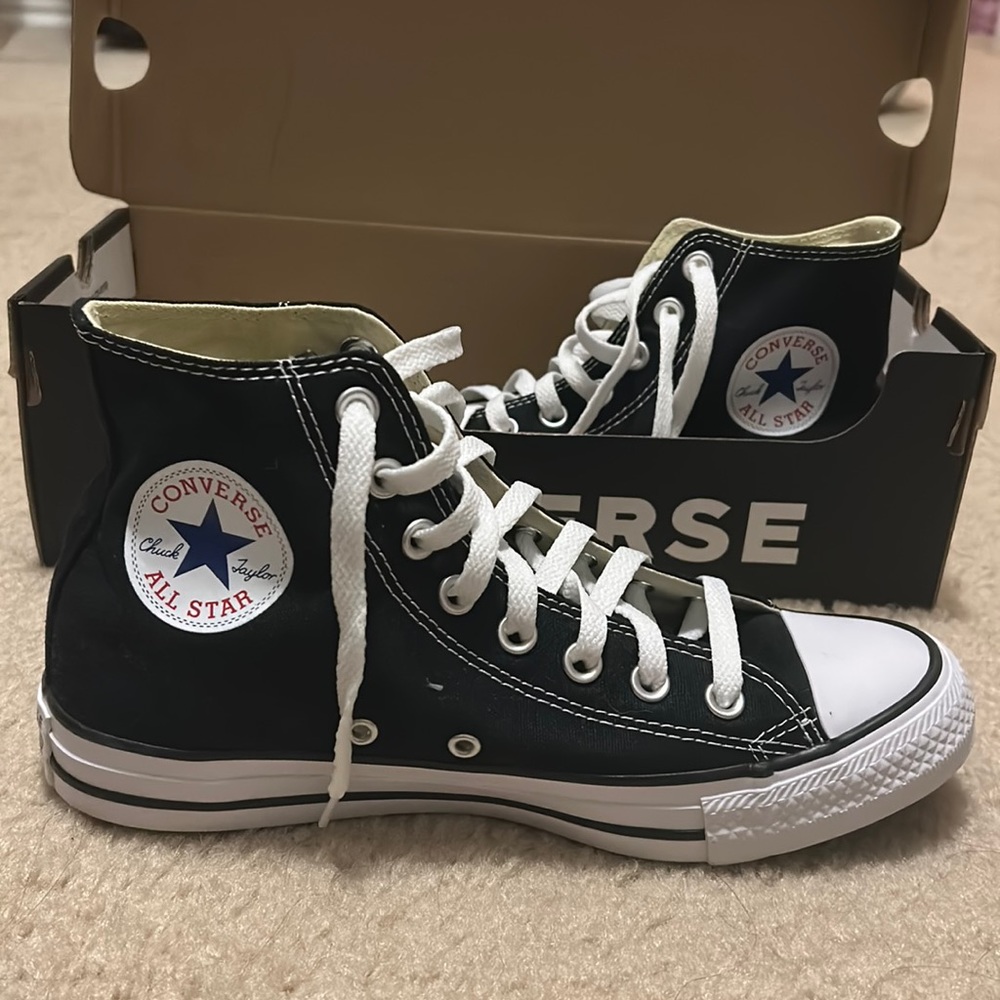 Unisex Black & White Converse High Top Sneakers. In Women’s Size 8.5/Men’s 6.5.